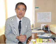 新妻 義輔さん